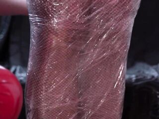 two Mistresses fastened up their maid with cling film and tickled her feet. Tickling, immobilization.