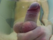 Underwater cumshot in the bathtub