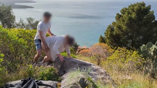 Spontaneous sex while hiking with a view over the city