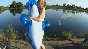 Alla gets ready to go home and blows off an inflatable vest and an inflatable whale!!!