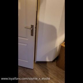 Peeing in a latex catsuit on the toilet