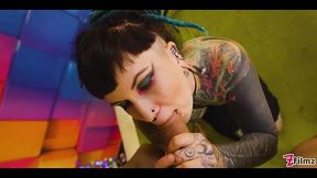 Tattooed model Illuz takes a hard cock in doggystyle