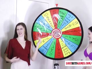 3 very hot gals play a game of disrobe spin the wheel