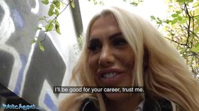 Blonde babe gets a face full of cum in public POV