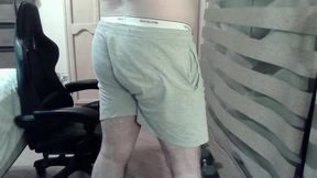 Muscular Camboy Flexes His Muscles and Squats