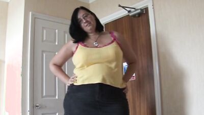 Chubby mature woman talks dirty while stroking that hard cock