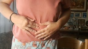 THREE TINY PEOPLE IN HER BELLY BUTTON