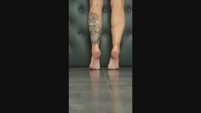 Muscle Legs and Bare Soles Teasing from Behind