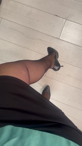Wife teasing in nylons, high heels and short skirt