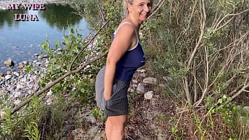 Busty blonde likes to get fucked doggystyle by the river