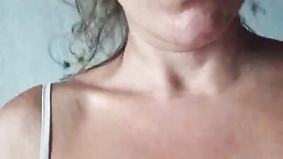 MILF gets naked and shows her pussy from up close while masturbating