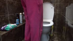 sit on the toilet with relief