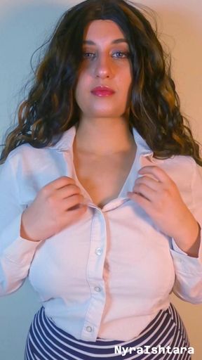 Hot brunette secretary with humongous breasts slowly unbuttons her shirt to reveal her chest