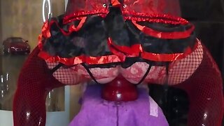 Crossdresser anal stretching and training with huge butt plugs, corsage, mini skirt, and latex stockings