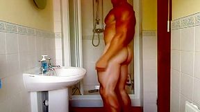 Bodybuilder showing off shower naked