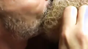 Amateur bear resists being kissed by another man