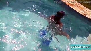 Cutie dark hair bimbo Candy swims underwater