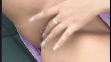 Classic milf, Cassandra is giving a nice handjob to her man, while by the pool
