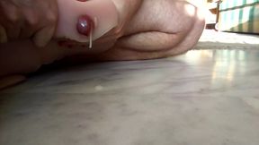 John fuck a fake pussy and cums all over the floor