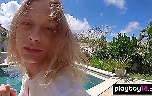 Skinny blonde ukrainian teen Clarise reveals her small tits in the pool