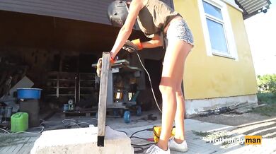 MILF welder flashes her nips while welding a tiny table POV