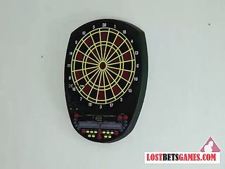 two nice-looking cuties play a game of disrobe darts