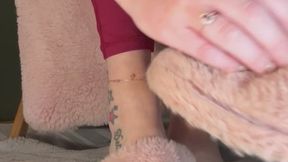 Fluffy slipper on barefeet
