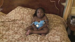 Ebony midget gets sprayed on her belly