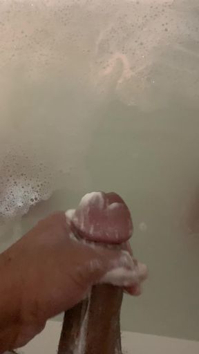 Stroking soapy cock