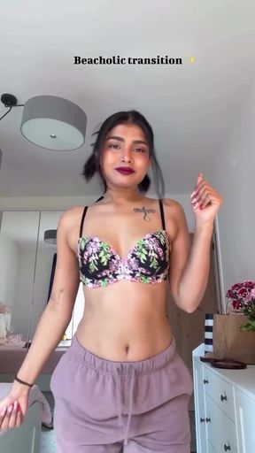 Indian babe in micro bikini shows off her ass