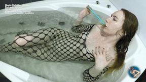 Ginger having fun in the bathtub 1