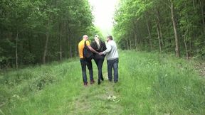 Blonde sucks two cocks then gets fucked to cumshot in the bushes