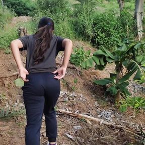 A cute slim Latina girl walks outdoors and flashes her big boobs and ass