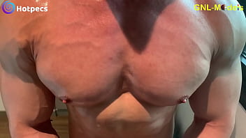 Ripped muscle asian guy oiled on his pecs nipple play