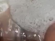 Pauline fingering herself during a delicious bath