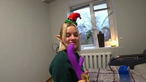 Blonde christmas elf-girl gets a purple present and a cock