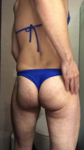 Femboy Alex Gold in sexual bikini