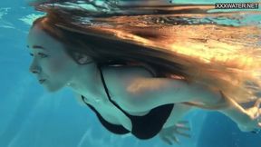 Blonde teen sizzles in naked water &mdash;  flawless body in motion