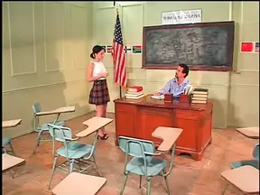 Hot ass chick on desk gets cum after hot fucking from teacher dude