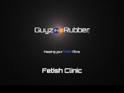 Guyzin2Rubber Fetish Clinic sees Dr Bennett man-handling his Patient's huge cock.Both in hot Rubber