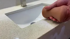 Hot wife pees on her hubby's thick member in a hotel bathroom