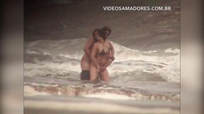 Shameless couple has sex in the shallow sea