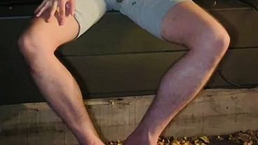 Amateur boy pee on himself in the garden (wets his grey shorts, grey undies and white tshirt)