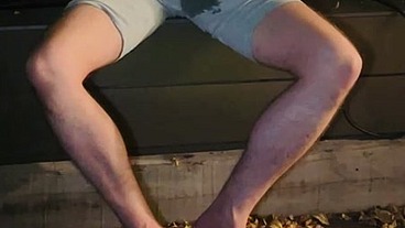 Amateur boy pee on himself in the garden (wets his grey shorts, grey undies and white tshirt)