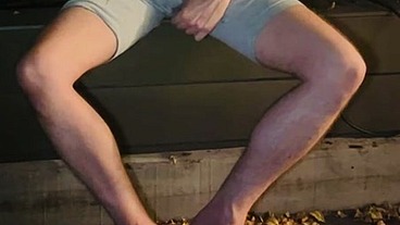 Amateur boy pee on himself in the garden (wets his grey shorts, grey undies and white tshirt)