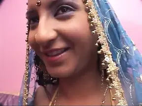 Amateur Indian honey gives a deepthroat blowjob to her lover's massive cock.
