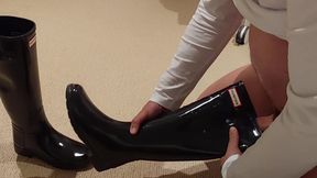 Wanked into her Hunter boots
