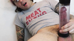 Alternate amateur man uses a penis pump for better stroking