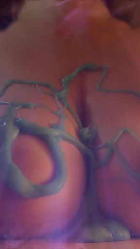Key moment from &quot;Worldest Most Beautiful Tits Ever 🍒 Young Artist Covers her Amazing Breasts with Slime - Slowmotion&quot;