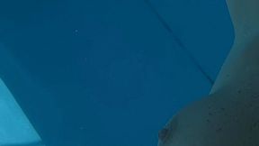 Carissa swimming nude in the pool set to music